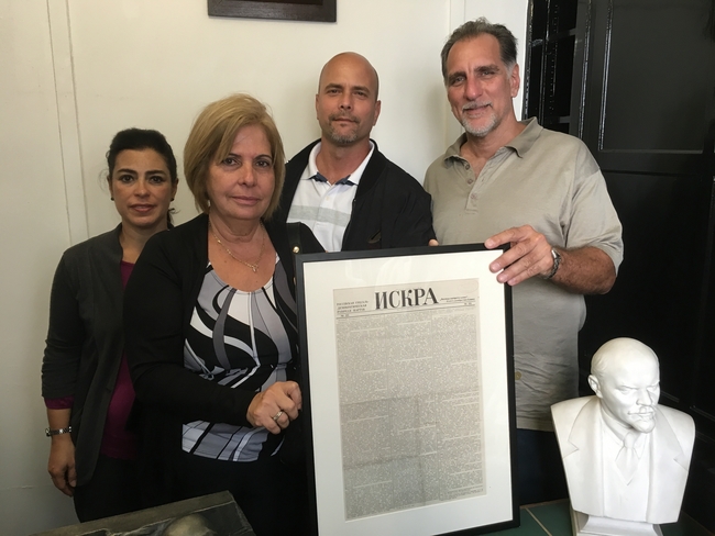 Rene, Gerardo, Adriana and Olga at the Marx Memorial Library with an original copy of Iskra, Spark