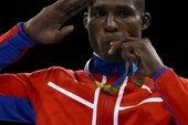 Julio César La Cruz on the podium with his gold medal in boxing, light heavyweight division, at Rio 2016