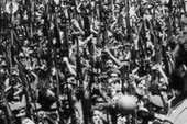 At a funeral for those killed in U.S. airstrikes, Fidel Castro proclaimed the socialist nature of the Cuban Revolution.