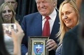 Donald Trump receives the Shield of Brigade 2506 at the Bay of Pigs Museum in Miami on Oct. 25 2016 as presidential candidate